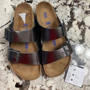 Soft footbed. New. Never worn.